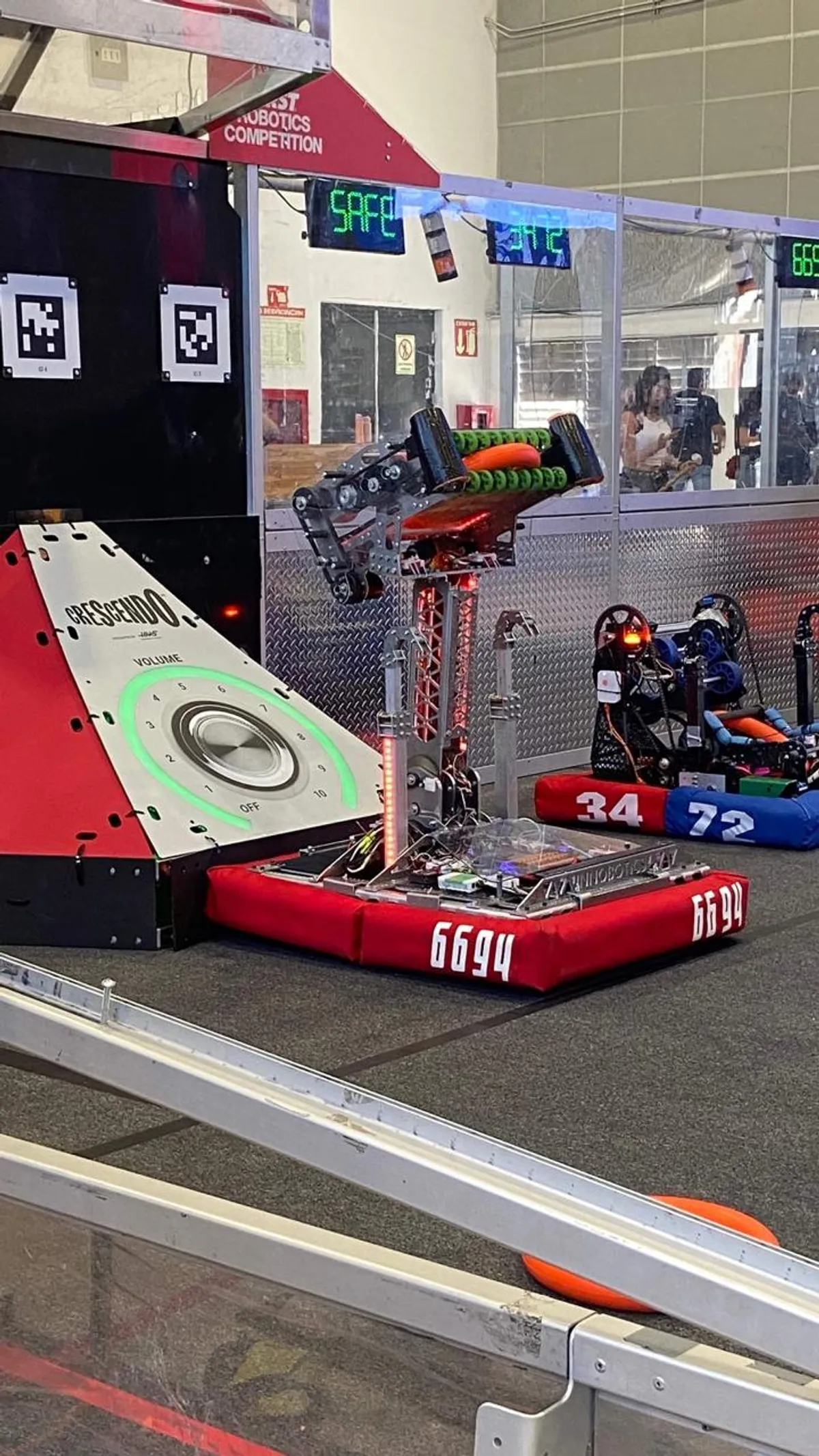 FRC Team 6694 robot on the CRESCENDO field, lined up at the speaker