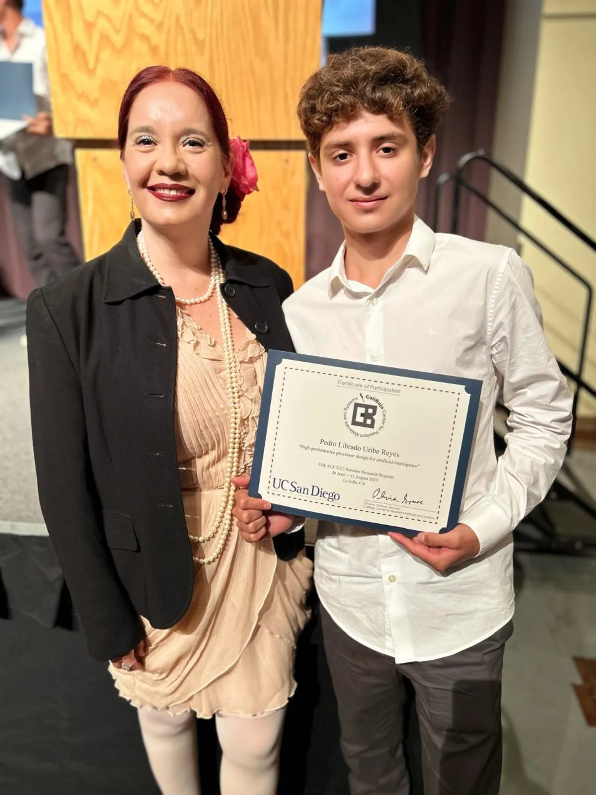 With Olivia Graeve, holding the UC San Diego ENLACE 2023 certificate of participation